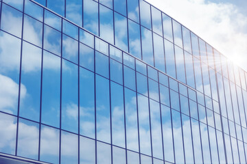 Obraz premium Exterior business office glass windows building. Modern success future development company concept.