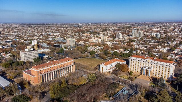 Mendoza, Argentina - 11 June 2022: Aerial view of government buildings and parklands in Mendoza, featuring neoclassical architecture, tree-lined streets, and a sprawling urban landscape.