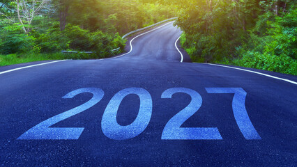 Vision 2027 on asphalt road ground. Business Target for 2027, Financial Goals and Business Strategy, Planning and Investment, not ai © rawintanpin
