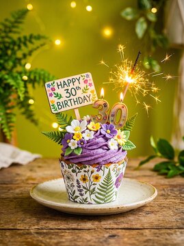 Purple Floral Cupcake With Sparkler and Glitter 30th Birthday Candle Celebration