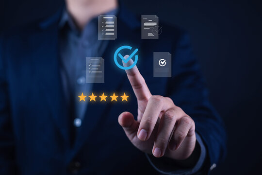 Business professional selecting a digital approval checkmark with document icons and five-star rating, representing quality assurance, quality control, compliance, certification, audit, customer satis