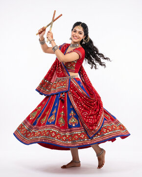 young indian garba dancer in traditional attire performing a graceful twirling pose representing gujarati culture navratri celebrations and indian folk dance heritage