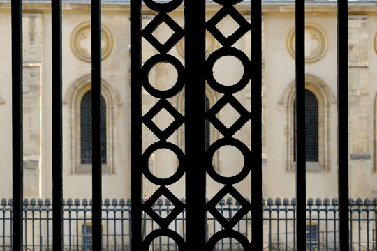 View Through a Geometric Gate in Paris