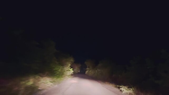 Vehicle Front Headlamp Beam Illuminating Pitch Black Highway Road