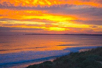 Fototapeta premium Millowl sunset, looking towards Pyramid Rock, from Anzacs beach, Phillip Island, Victoria, Australia