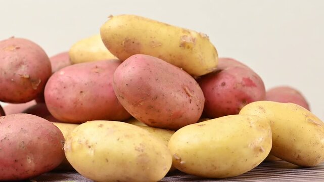 video of yellow and pink new potatoes