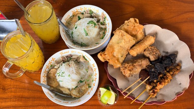 Authentic Indonesian Food Set with Soto Seger Boyolali, Sate Paru, Sate Kulit, Fried Tempeh, and Orange Juice