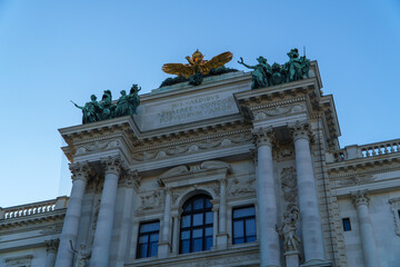 Fototapeta premium Majestic Neue Burg Facade with Golden Eagle Sculpture at Hofburg Palace in Vienna Austria