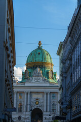 Obraz premium Majestic Dome Of Palace Framed By Historic Urban Buildings In Vienna, Austria