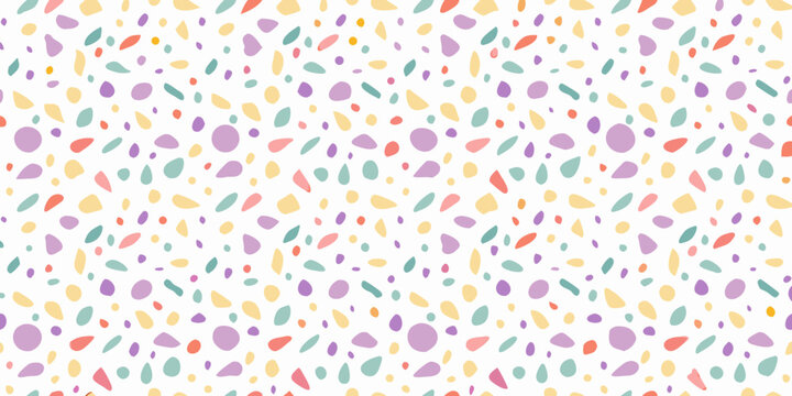 Colorful terrazzo pattern with speckled shapes on a white background