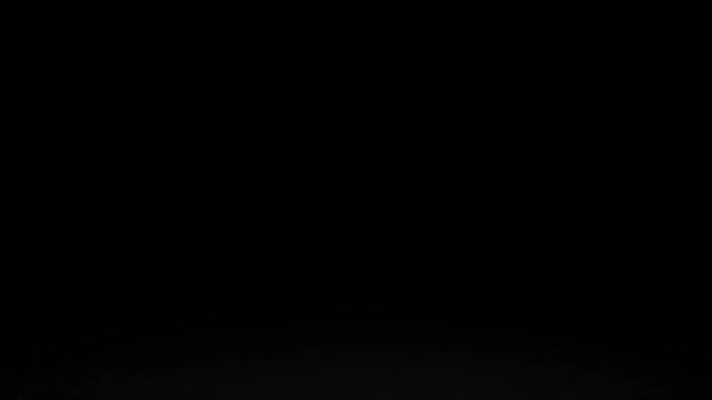 absolute darkness black background providing an empty space with a minimalist void ideal for creative design and abstract concepts.