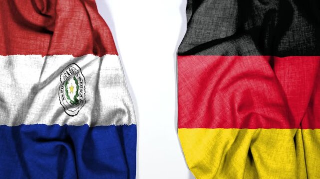 big waving realistic national colorful flag of germany and national flag of paraguay