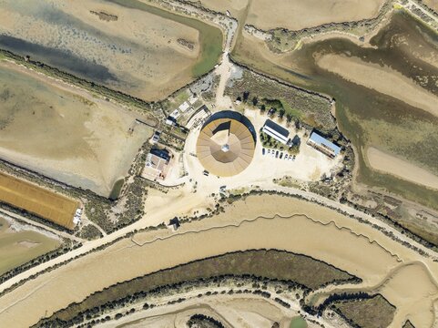 The Natural Resources Center of the Salinas de Chiclana saltworks near Chiclana de la Frontera. Aerial view. Drone shot. Bah&iacute;a de C&aacute;diz Nature Reserve, C&aacute;diz province, Andalusia, Spain