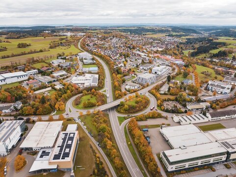City panorama with street and buildings in autumn colors seen from a bird's eye view, Dornstetten, Freudenstadt district, Germany