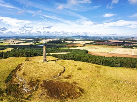 Waterloo Monument over Scottish fields and farms from a drone, Jedburgh, Scotland, UK