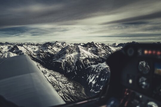 Flight over the late winter Lech Valley with a small aeroplane in Tyrol, Austria