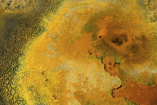 Detailed view of a mineral-rich volcanic landscape in intense shades of orange, geothermal area, rainbow rocks Tuzla, Ayvacık, Ayvacik, &Ccedil;anakkale, Canakkale, Turkey