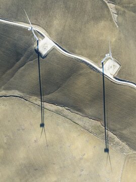 Windmills on a wind farm near Zahara de los Atunes. Aerial view. Drone shot. C&aacute;diz province, Andalusia, Spain