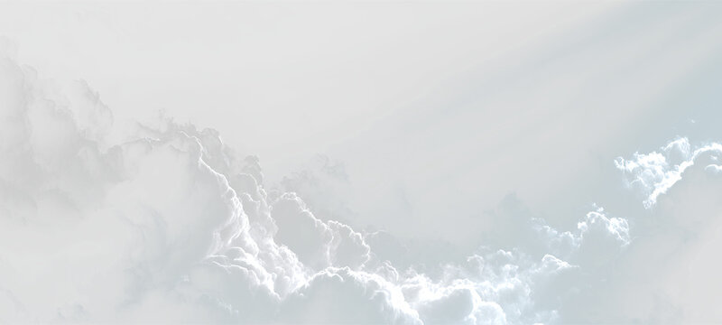 Clouds with sunlight breaking through in a bright sky during afternoon hours seen from above, on a transparent background
