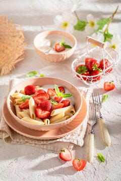 Delicious and homemade pasta with berries, yogurt and mnt.