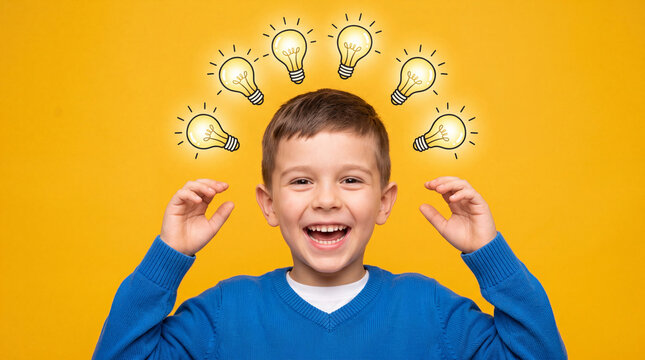 Happy young boy smiling with light bulb icons floating above his head against a bright yellow background representing creativity and new ideas