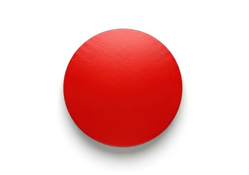 Bright red circular button or pill on plain background isolated on white background