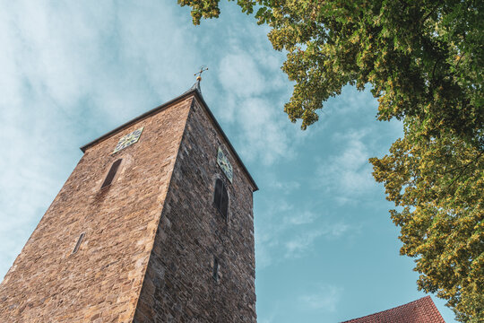 St. Martin Church Bramsche Historic Stone Church Tower with Clock at Market Square in Lower Saxony Germany