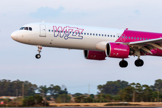 Luqa, Malta - June 26, 2026: Wizz Air Airbus A321-271NX (REG: HA-LVQ) landing in the low evening light.