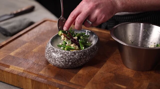 Colorful fresh salad with vegetables and creamy goat cheese, healthy eating concept.