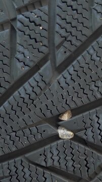 Dark tires with visible structure highlight protective tread. Autumn transition secures driving safety. Summer rubber hardens in frost while winter tire guarantees reliable performance