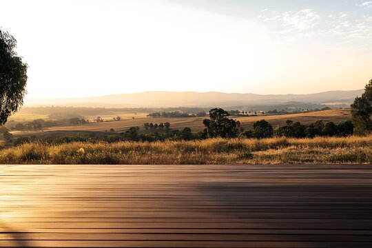 Golden hour sunset over rolling hills and rural landscape