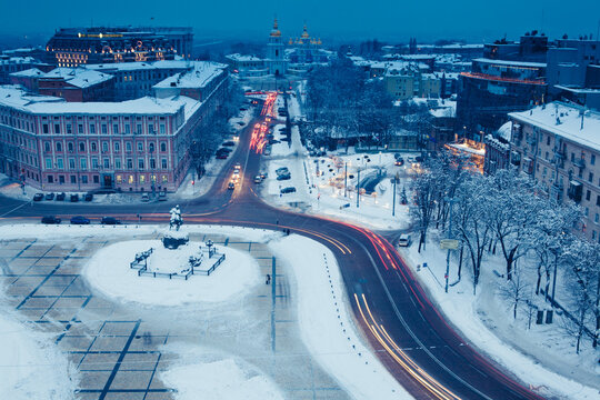 KYIV, UKRAINE
JANUARY  High
angle city view of Sofia
Square covered in snow at
twilight with Bohdan
Khmelnytsky monument
and Saint Sophia
Cathedral in the
background