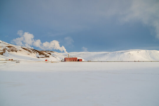 Geothermal power station in snowy Icelandic winter landscape near Krafla