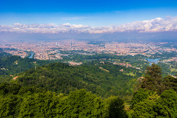Fototapeta premium Panoramic view of the city of Turin and the Alps from the dome of the Basilica di Superga
