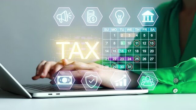 Person working on a laptop with tax-related digital icons and a calendar at an office desk during the daytime.