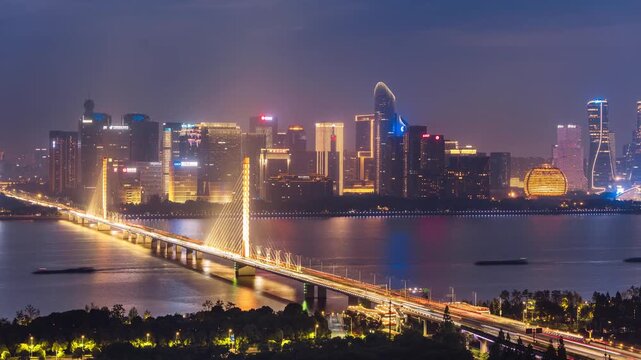 High angle timelapse of the Qianjiang Third Bridge and Qianjiang New District in Hangzhou, Zhejiang Province, China