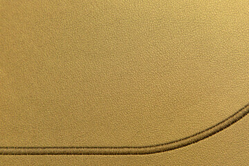 golden leather texture. Detailed metallic leather pattern with rich gold color and natural grain. Luxury background for fashion branding, packaging mockups, advertising, and decorative design © ir1ska