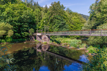 Fototapeta premium Bridge over the Nagold in the summer