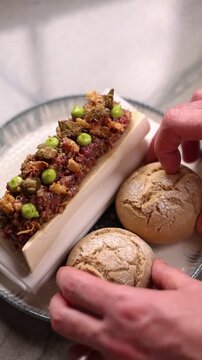 Beef tartare served in a fine dining restaurant, close-up gourmet appetizer