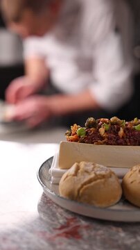 Beef tartare served in a fine dining restaurant, close-up gourmet appetizer