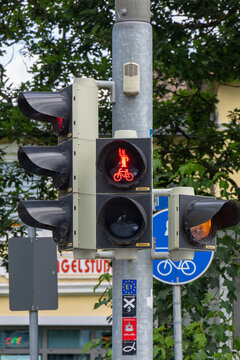 red traffic light at a pedestrian crossing with symbol of Arminius the Cheruscan or Herman the Cheruscan