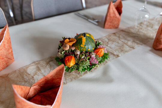 Thanksgiving Table Decor with Gourd and Flowers