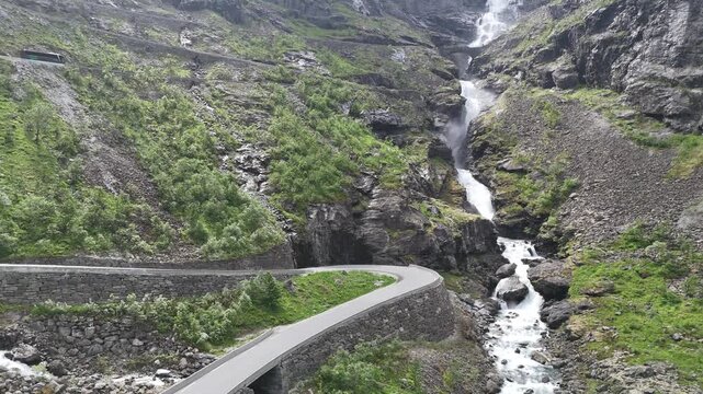 Aerial drone vertical reveal over Stigfossbrua at lower Trollstigen, Norway