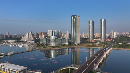 Rizhao city skyline with modern high-rise buildings and coastal bay view in Shandong Province © zhu difeng