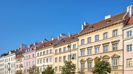 Obraz premium A street view of the buildings in Warsaw Old Town, Poland.