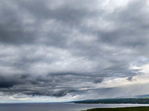 Dramatic storm clouds gathering over Nusa Lembongan coast in Bali, Indonesia