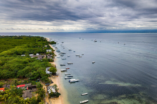 Aerial view of boats anchored along Nusa Lembongan beach, Indonesia