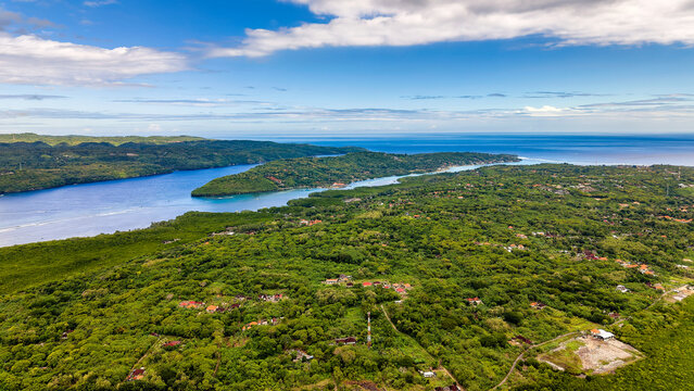 High angle perspective of a scenic tropical landscape under a blue sky