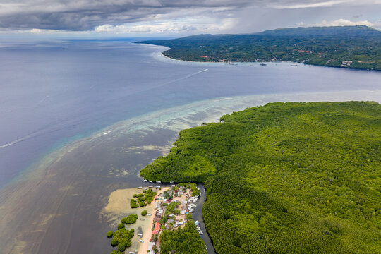 Aerial drone view of lush mangrove forest on Nusa Lembongan island, Indonesia