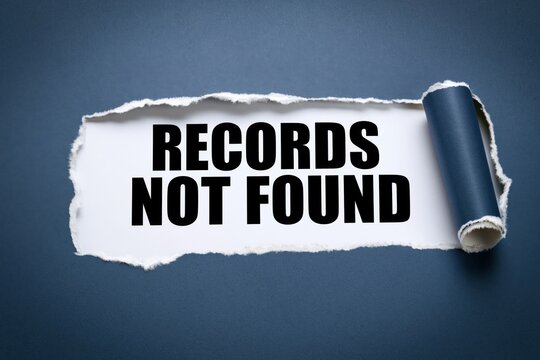 Records Not Found text revealed under torn dark blue paper on white background